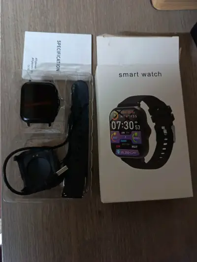 Reloj inteligente con pantalla táctil y cargador - miniatura 2