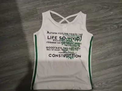 Polera sin mangas blanca con diseño gráfico - miniatura 1