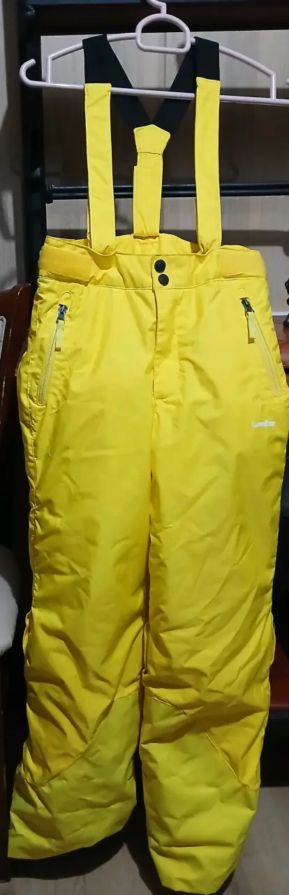 Pantalones de nieve amarillos con tirantes