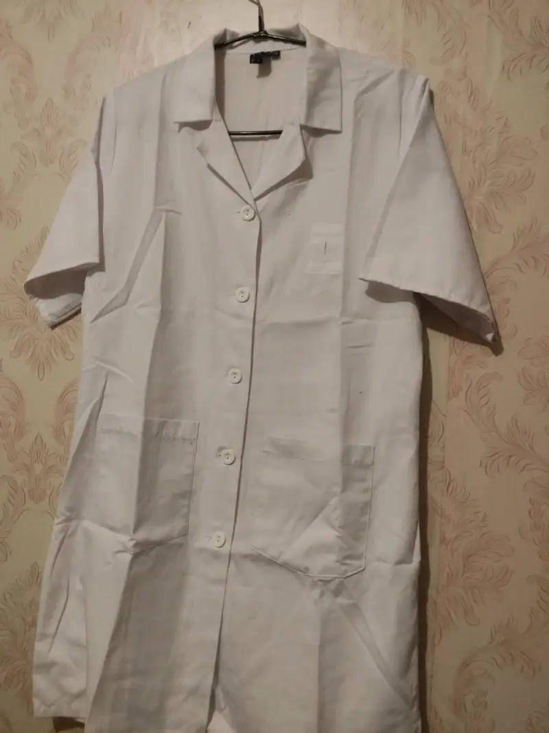 Delantal médico blanco unisex