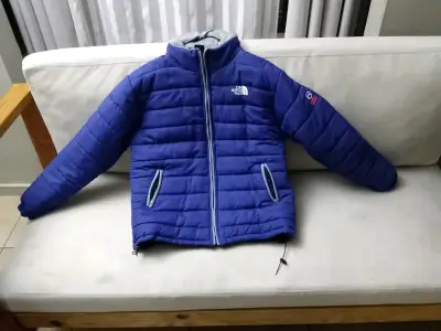 Chaqueta azul The North Face con capucha - miniatura 1