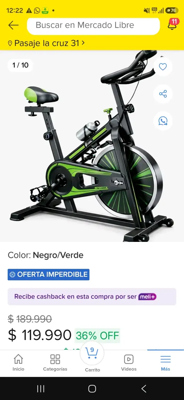 Bicicleta estática negra y verde con resistencia ajustable