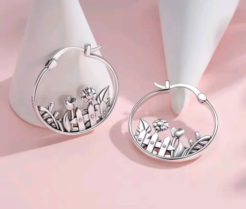 Aros de plata con diseño floral - 3
