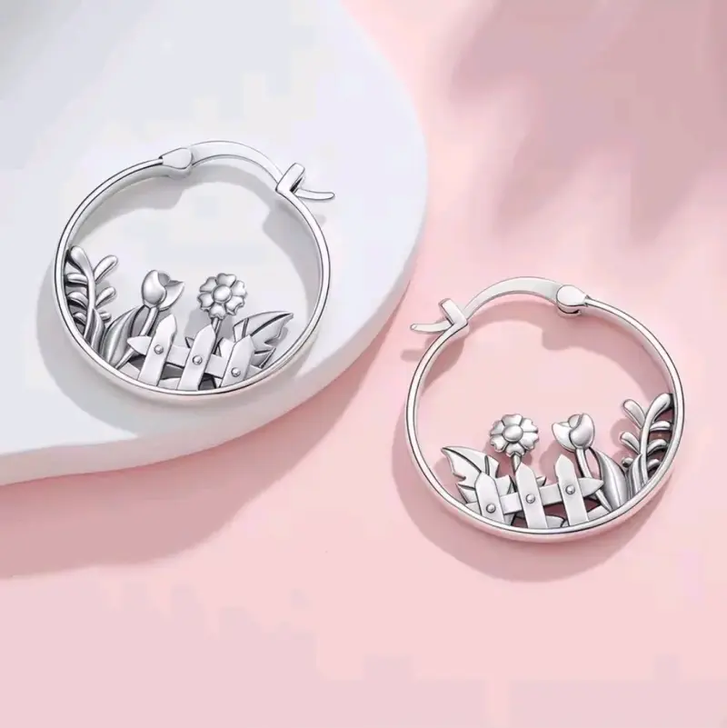 Aros de plata con diseño floral - 4