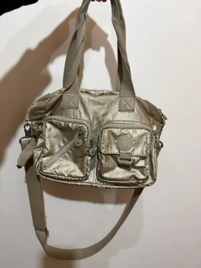 Bolso Kipling dorado con múltiples bolsillos - miniatura 1