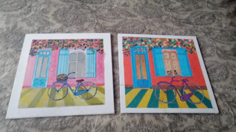 Cuadros decorativos con bicicletas y casas coloridas