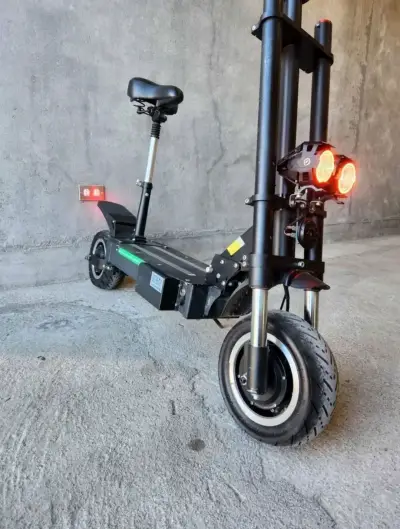Scooter eléctrico con asiento y doble motor 2800W - miniatura 1