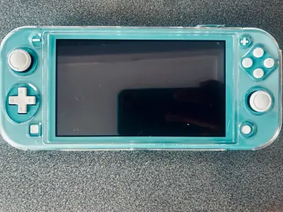 Nintend Switch Lite Turquesa en Buen Estad - miniatura 2