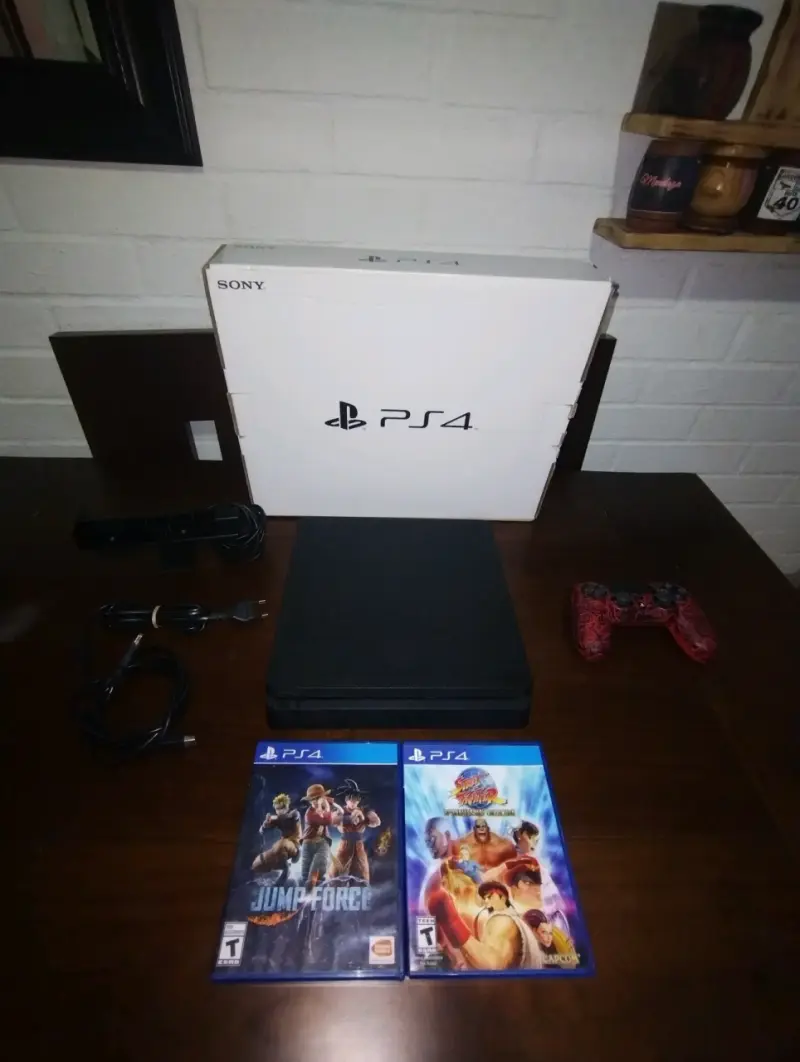 Consola Sony PS4 con juegos y control - 2