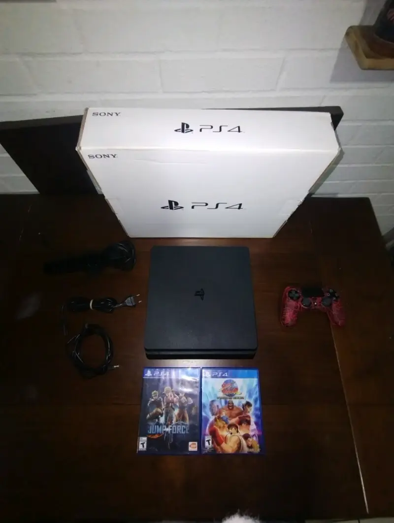 PlayStation 4 Slim 1TB + Caja + Cámara + 2juegos - 1