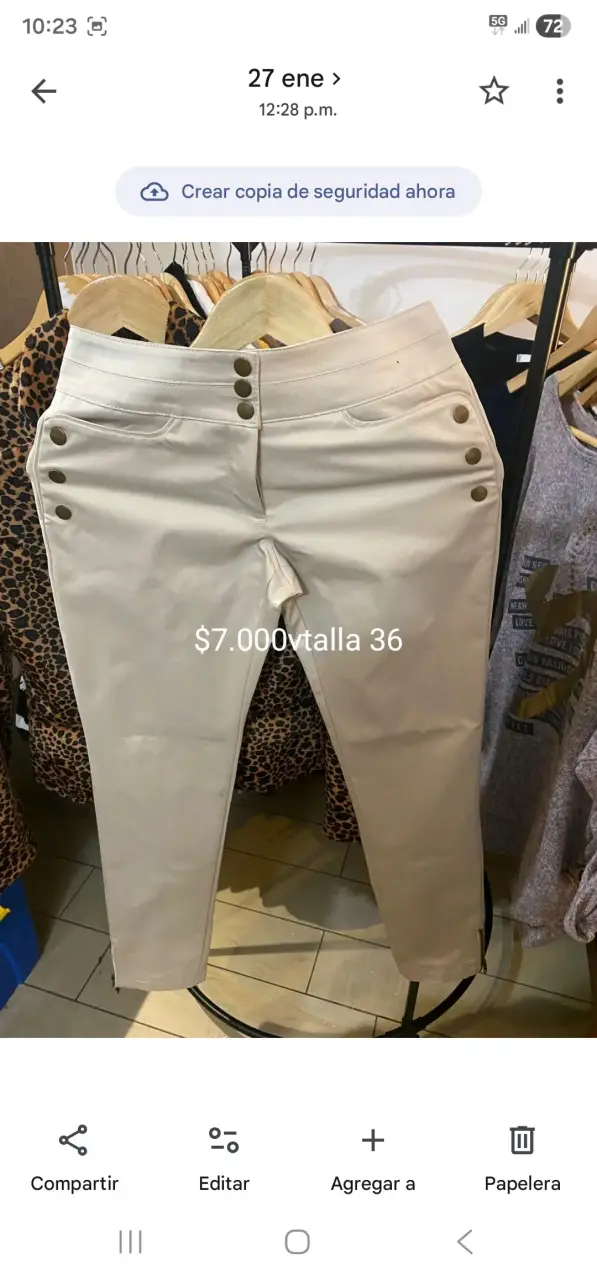 Pantalones beige con botones talla 36