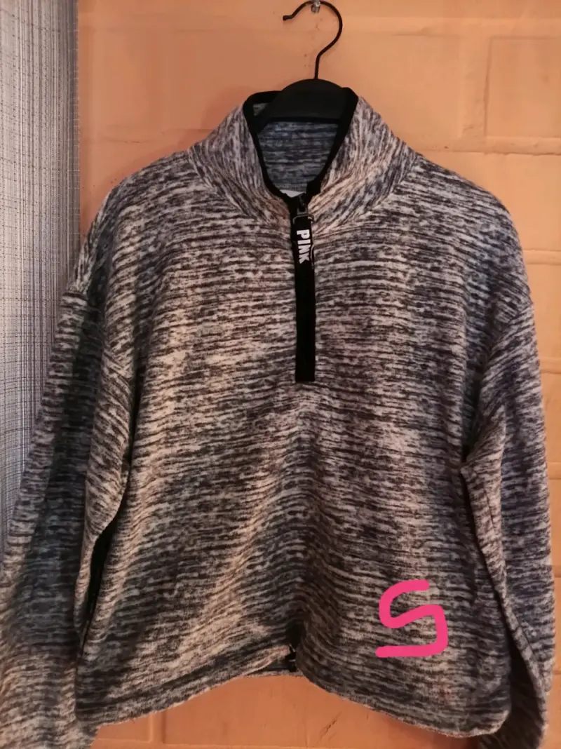 Polerón gris jaspeado con cierre PINK