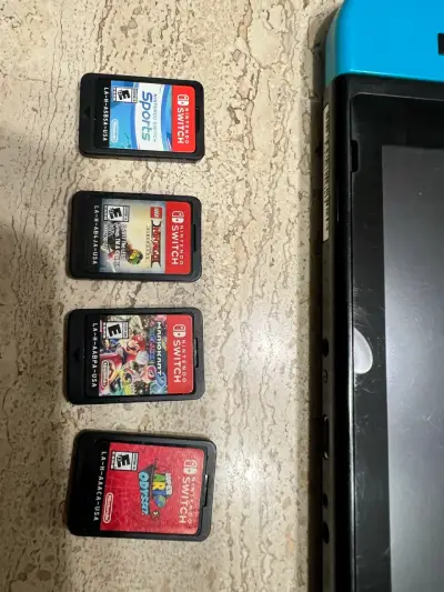 Nintendo Switch con juegos y accesorios - miniatura 2