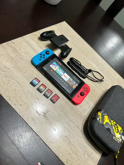 Nintendo Switch con juegos y accesorios - miniatura 3