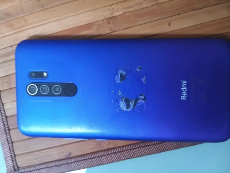 Smartphone Redmi 9 azul con cámara cuádruple - 1