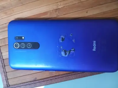 Smartphone Redmi 9 azul con cámara cuádruple - miniatura 1
