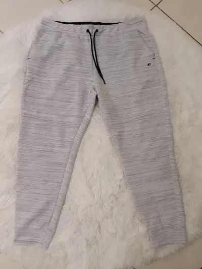 Pantalones deportivos grises con cordón ajustable - miniatura 1