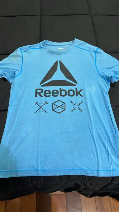 Polera deportiva azul Reebok para hombre - miniatura 1