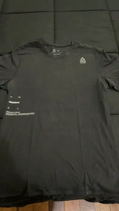Polera Reebok CrossFit negra para entrenamiento - miniatura 1