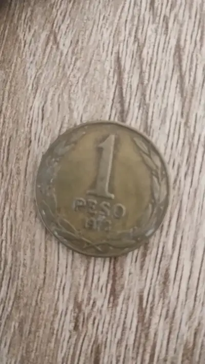 Moneda antigua de 1 peso chileno 1976 - miniatura 1