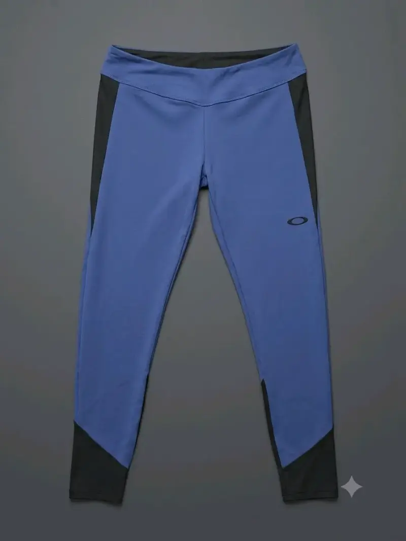Leggings deportivos Oakley azul y negro - 1