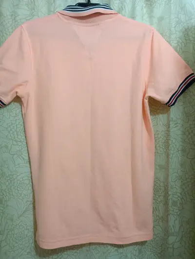 Polera Polo Rosa Tommy Hilfiger Unisex - miniatura 1
