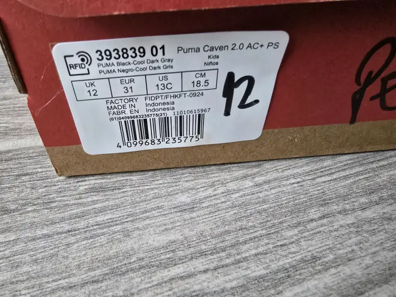 Zapatillas negras para niños Puma Caven 2.0 - 2