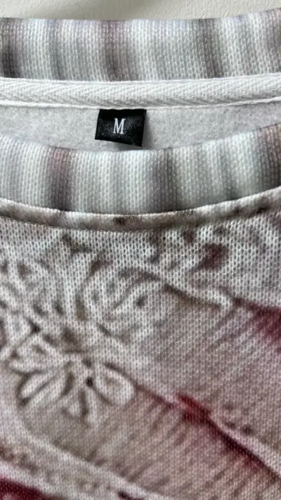 Vestido  con diseño floral en tonos rosados - miniatura 2