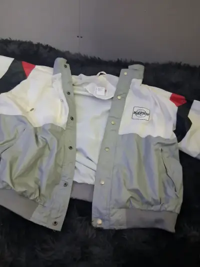 Chaqueta MVP cortaviento multicolor con capucha - miniatura 1