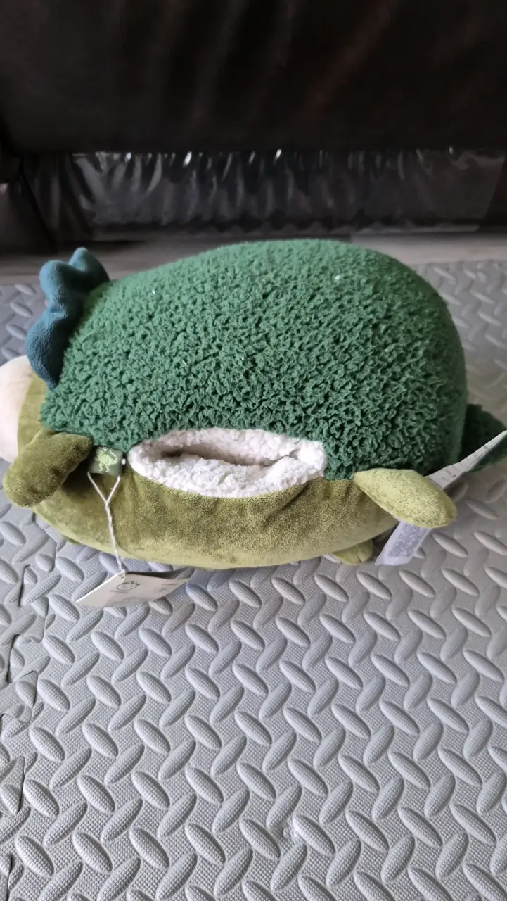 Peluche dinosaurio verde con abriga manos - 2