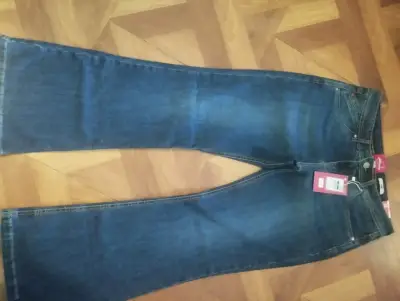 Jeans flare mujer azul oscuro con etiquetas - miniatura 1