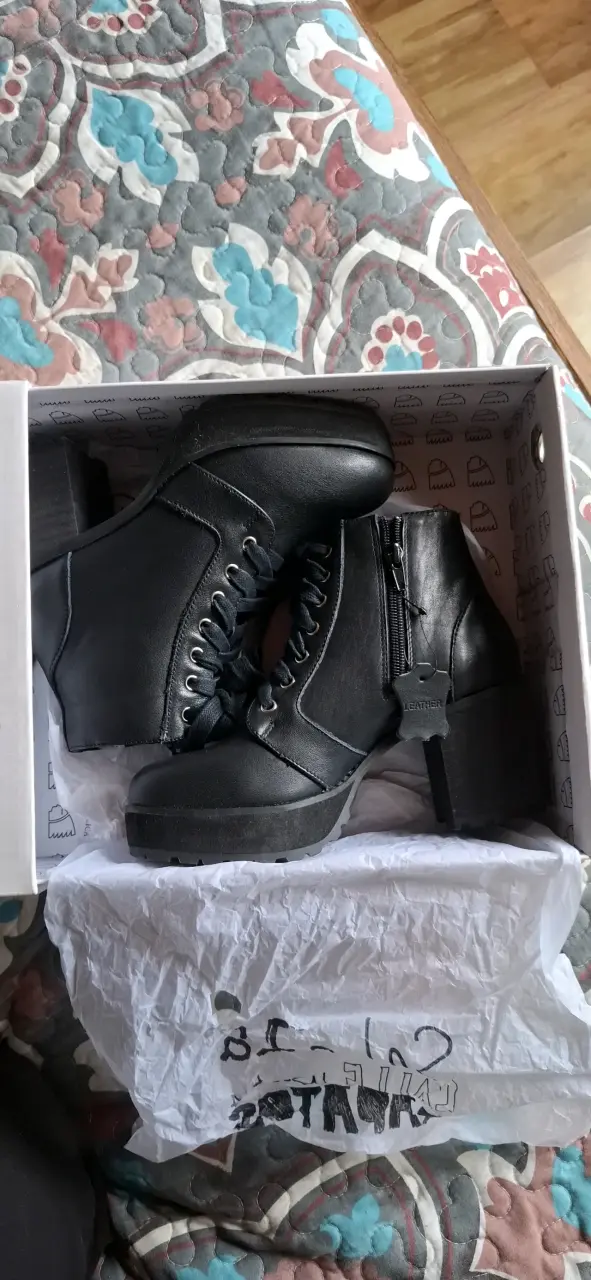Botines de cuero negro con taco alto - 1