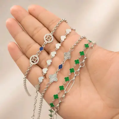 Pulseras de plata con dijes decorativos - miniatura 1