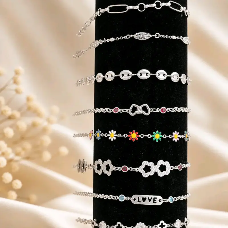 Pulseras de plata con dijes decorativos - 2
