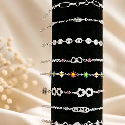 Pulseras de plata con dijes decorativos - miniatura 2