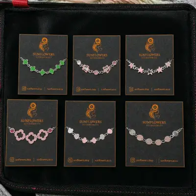 Pulseras y aros de plata Sunflowers con diseños variados - miniatura 1