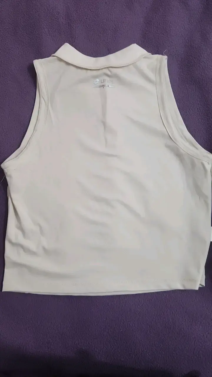 Polera sin mangas blanca con diseño deportivo - 3
