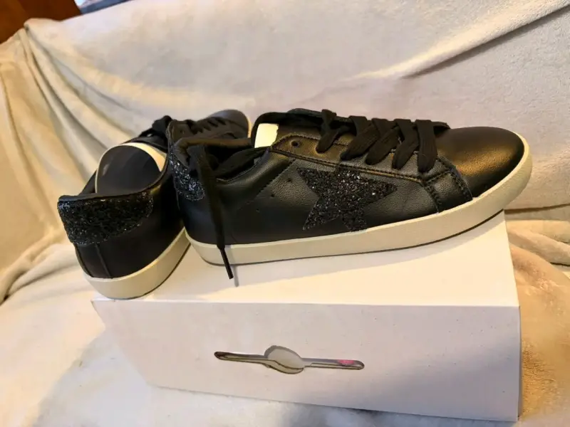 Zapatillas negras con estrella de glitter - 1