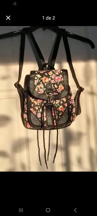 Mochila floral negra con diseño vintage - miniatura 1