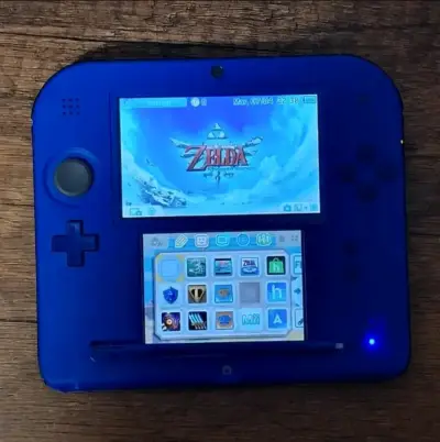 Consola Nintendo 2DS Azul con accesorios - miniatura 1