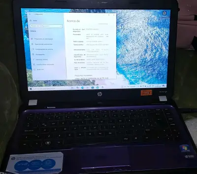 Notebook HP Pavilion g4 morado con AMD E2 - miniatura 1