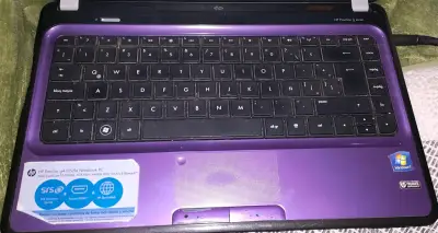 Notebook HP Pavilion g4 morado con AMD E2 - miniatura 3