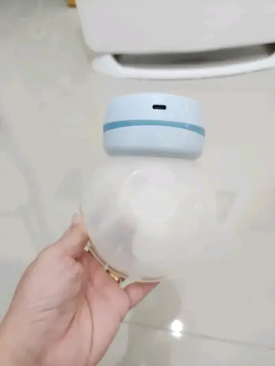 Extractor de leche eléctrico portátil - miniatura 3