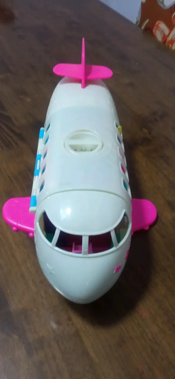 Avión de juguete con compartimentos interiores - 1