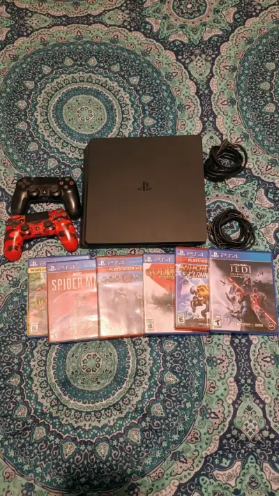 Consola PS4 con 2 controles y 6 juegos - miniatura 1