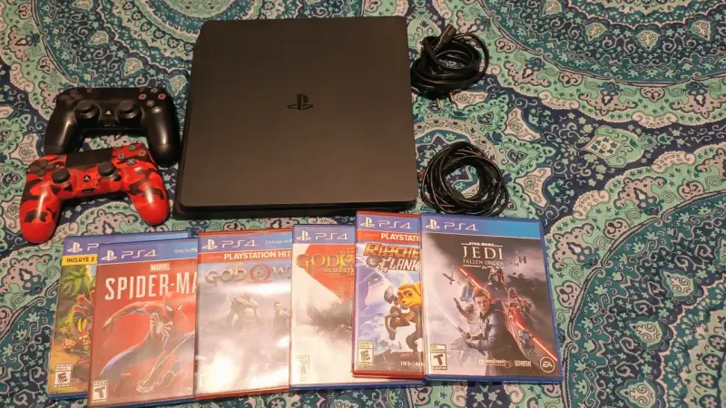 Consola PS4 con 2 controles y 6 juegos - 3