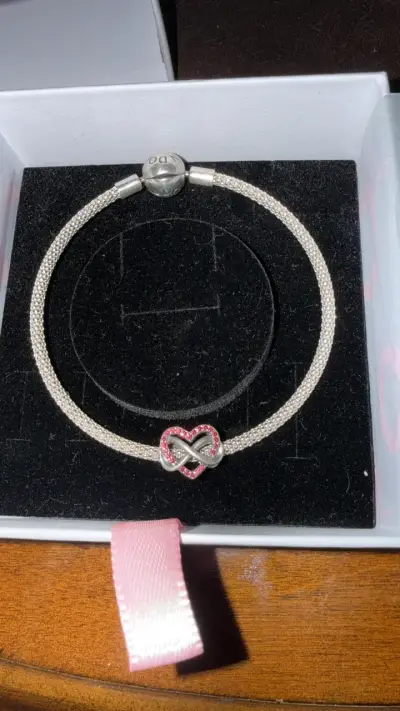 Pulsera Pandora con dije de infinito y corazón - miniatura 1