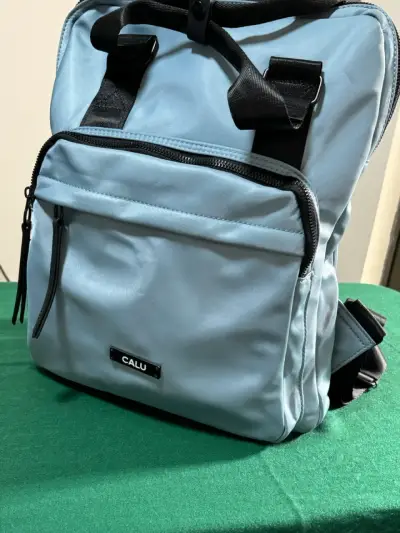 Mochila azul claro Calu con correas ajustables - miniatura 1