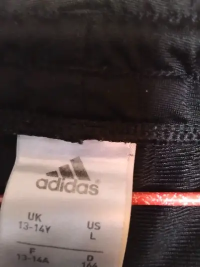 Pantalones deportivos negros Adidas talla L - miniatura 1