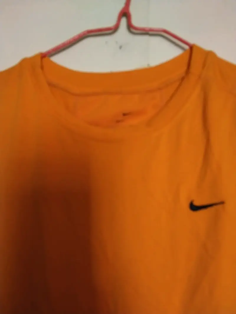Polera sin mangas Nike naranja para hombre - 1